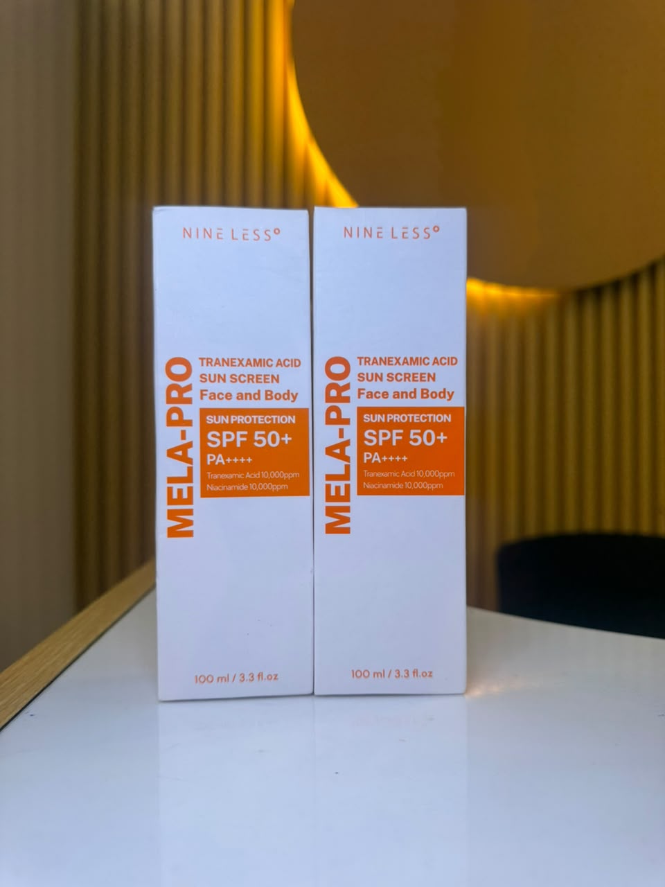 NINE LESS MELA-PRO Tranexamic Acid Sunscreen SPF 50+ PA++++ (100ml)